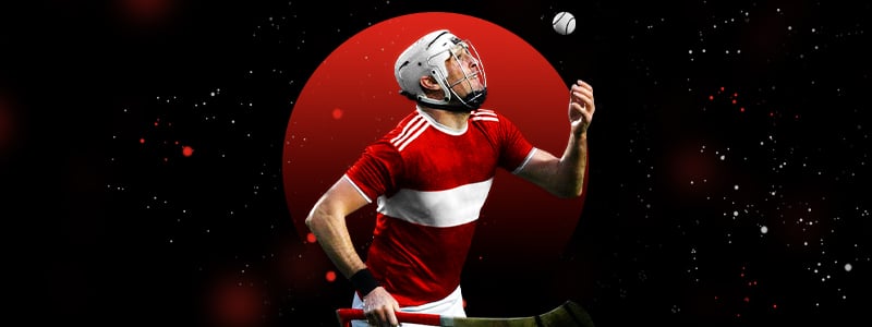 hurling player preparing to strike