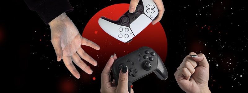 players' hands holding esports joysticks 