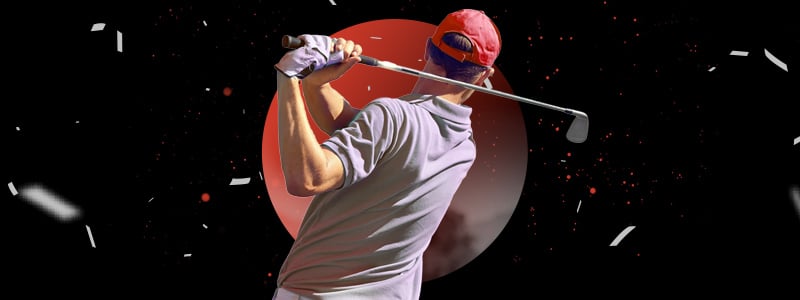 a golf player preparing to hit the ball with the stick