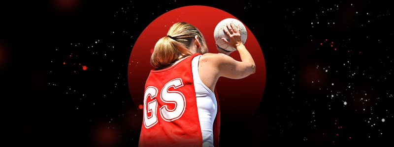 netball player throwing the ball