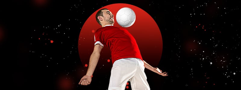 futsal player trying to hit the ball