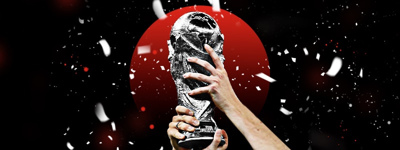 fifa players' hands holding the trophy