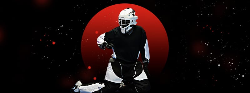 floorball player with sports equipment